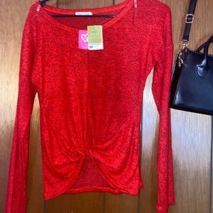 red sweater, great for Christmas or if you like red.